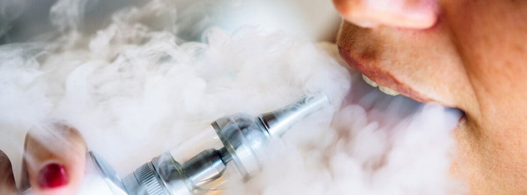 Oral Health Implications of E-Cigarettes and Vaping